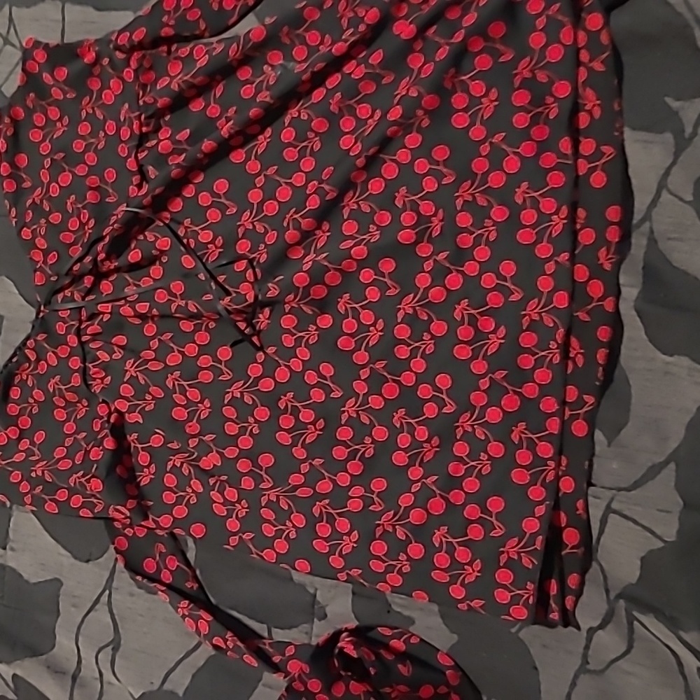 Cherry design on tie back tank